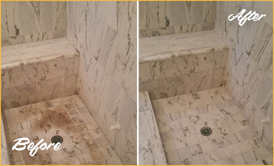 Before and After Picture of a Dirty Spencer Marble Shower Cleaned to Eliminate Dark Stains
